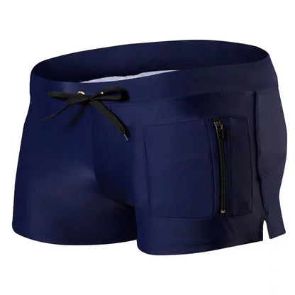 Men's black high-waisted swimming trunks with a white lace-up front closure, laid flat.