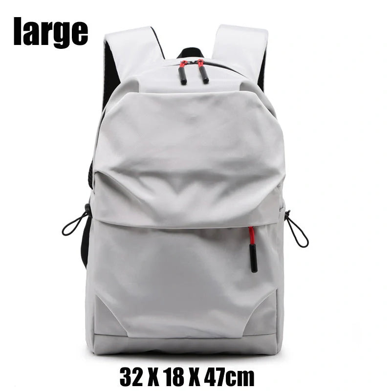 Sleek and durable nylon backpack with spacious compartments for everyday use.