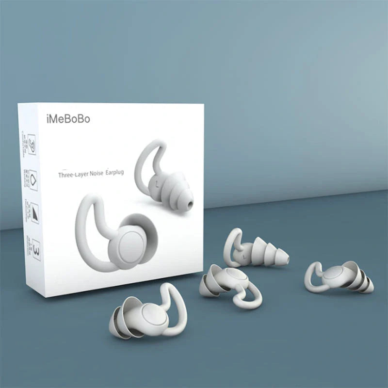Silicone anti-noise sleep earplugs in grey and black, featuring shark fin design for secure fit