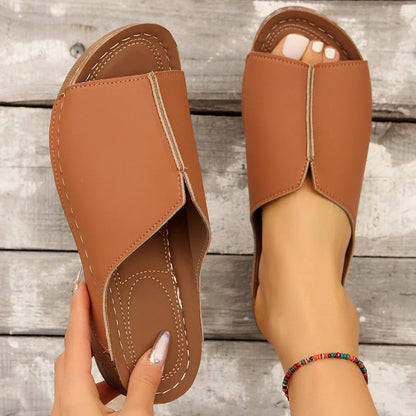 Trendy wedge sandals for women in various colors, featuring a unique European-inspired design, cushioned footbed, and non-slip sole for comfort and style.