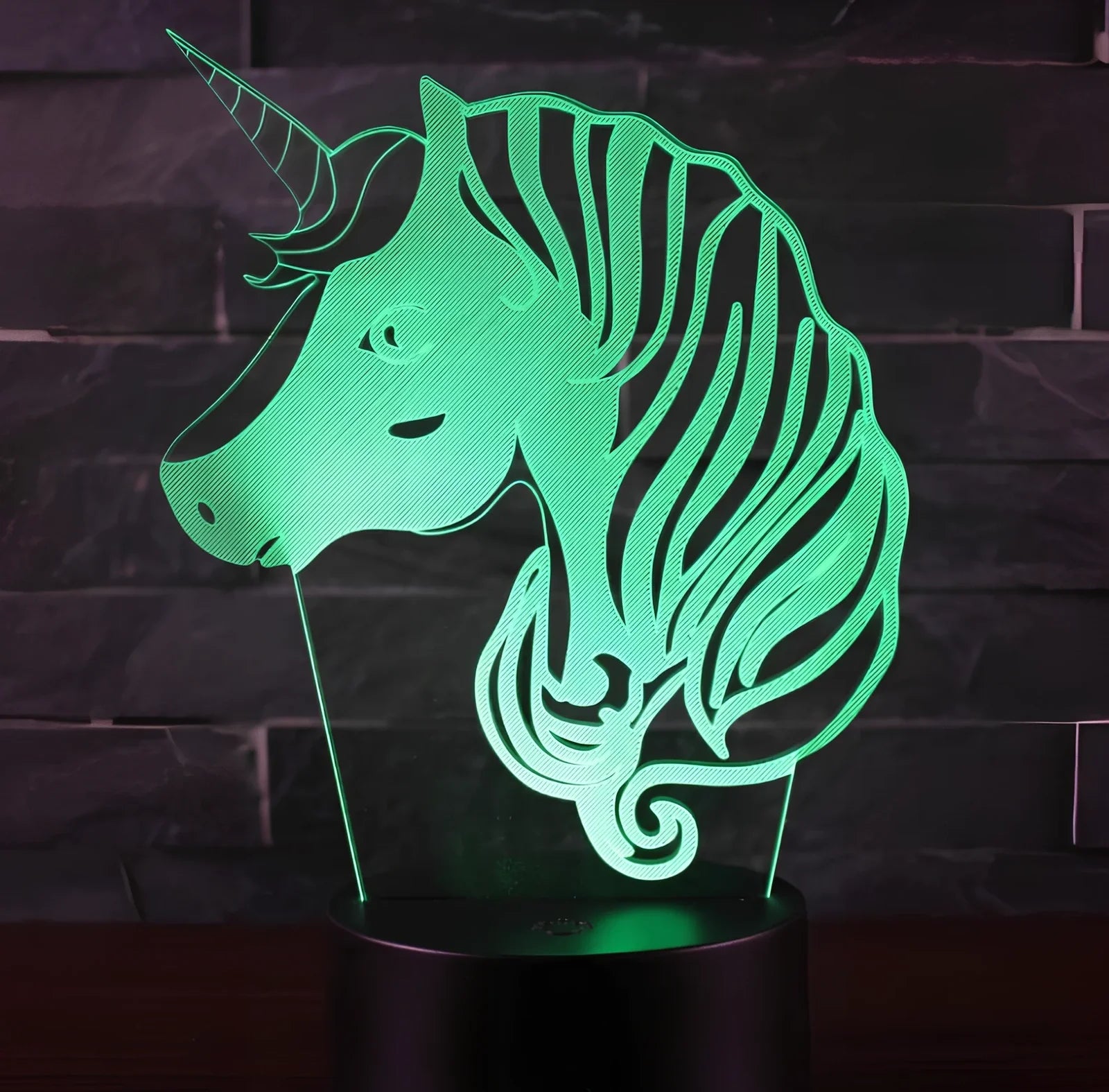 3D unicorn night light with LED illumination on 23cm black ABS base, showing touch controls and USB cable
