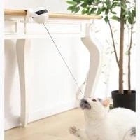 Interactive electronic motion cat toy with real fur ball for engaging playtime