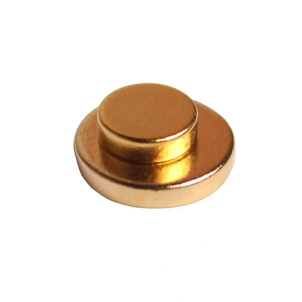 Discreet gold-toned anti-smoking auricular therapy magnet for quitting smoking through acupressure