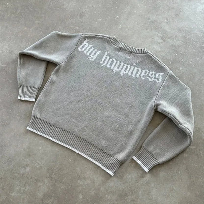 Grey loose-fitting jacquard knit coat with long sleeves on a hanger