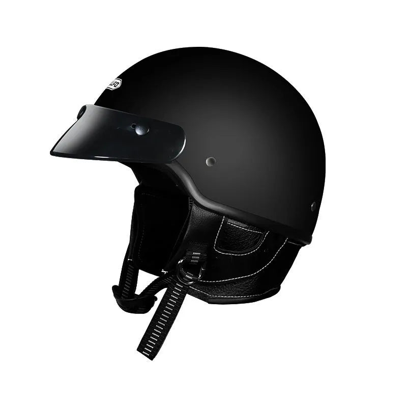 Retro full-face motorcycle helmet on a plain background, shown in cement grey colour.