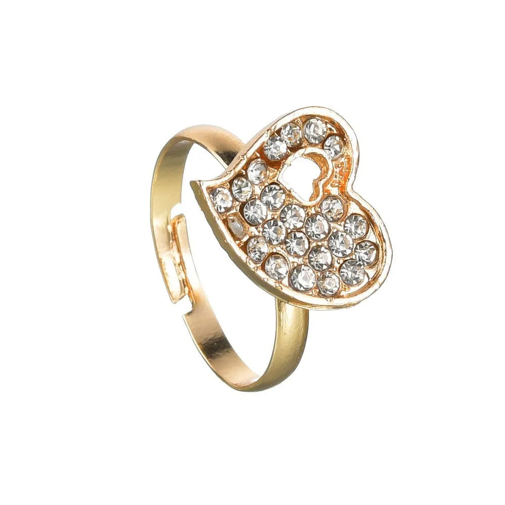 Gold-coloured women's love jewellery set with earrings, pendant and bracelet featuring bell patterns