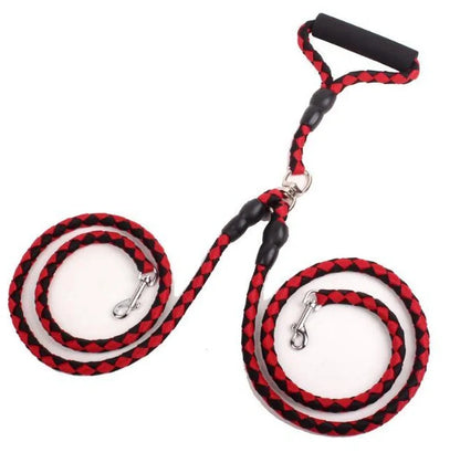 Double-ended dog walking rope with padded handles and reflective threads, showing metal clip hooks