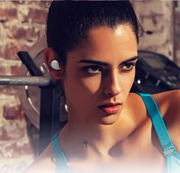 Black and white M18 true wireless in-ear Bluetooth earbuds with charging case.