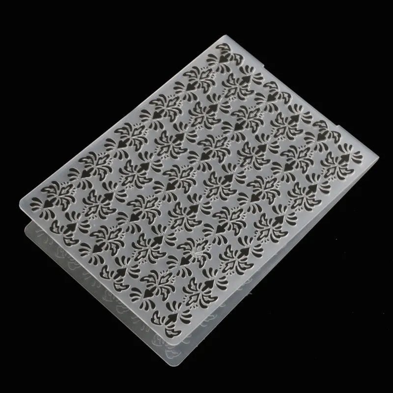 Set of ten plastic cake decorative moulds showing windmill, star, flower, and butterfly patterns.