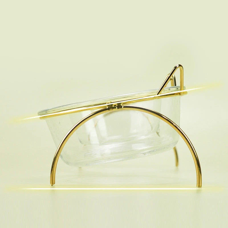 Elegant glass cat bowl with raised metal stand for pets, featuring a shimmering glass bowl and sturdy metal frame to support your cat's hydration and posture.