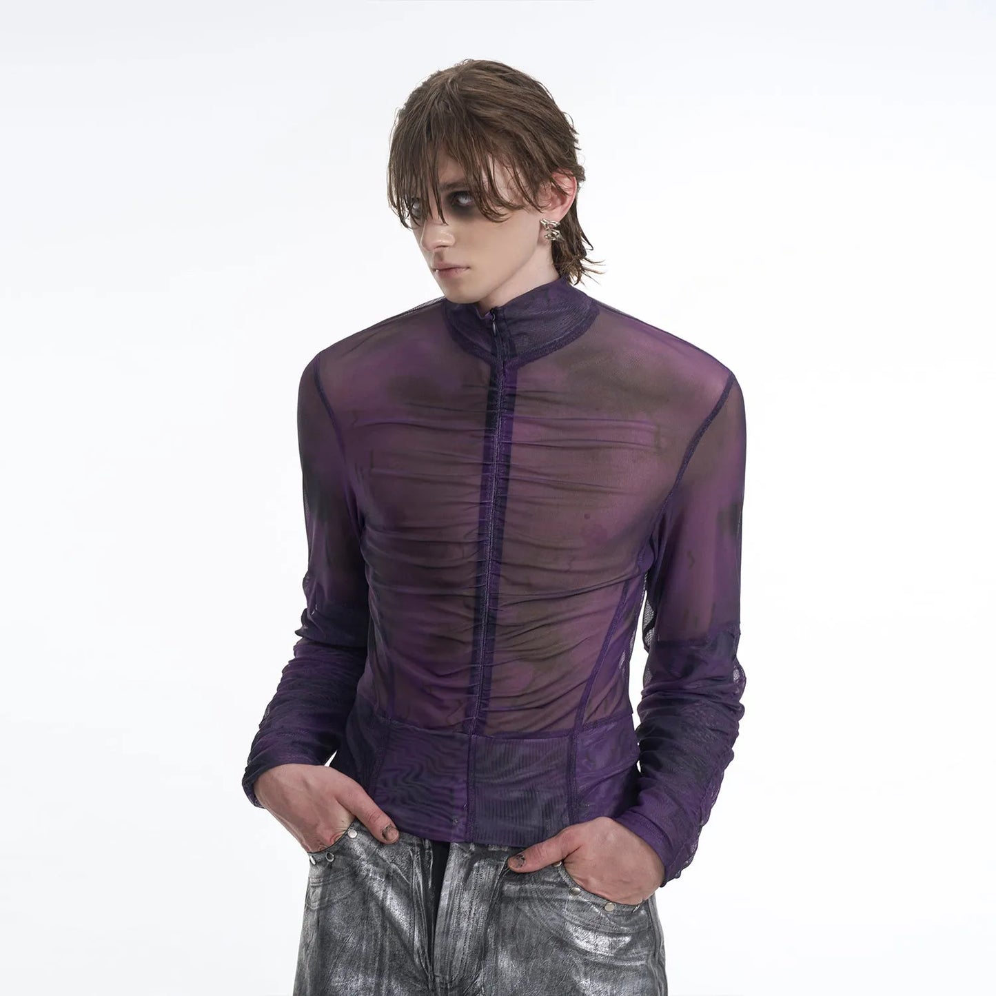 Man wearing a black and red long-sleeved round neck T-shirt showing regular thickness fabric.