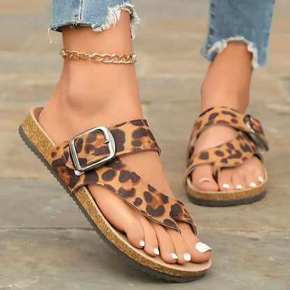 Leopard print Roman style slippers with a round toe and wooden sole.