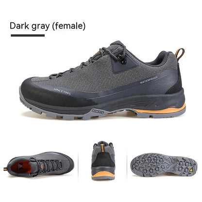 Men's low-top hiking boots in black with lace-up front and rubber outsole.