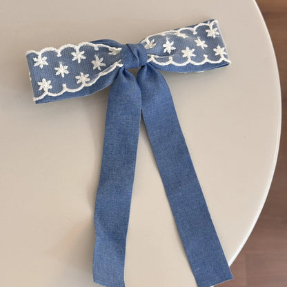 Cloth barrette hairpin set showing blue bow, beige lace, and pearl butterfly designs