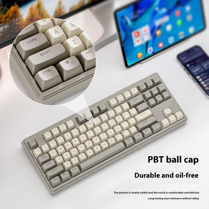 Wolf M87 wireless Bluetooth dual-mode mechanical feeling keyboard in blueberry colour on a desk