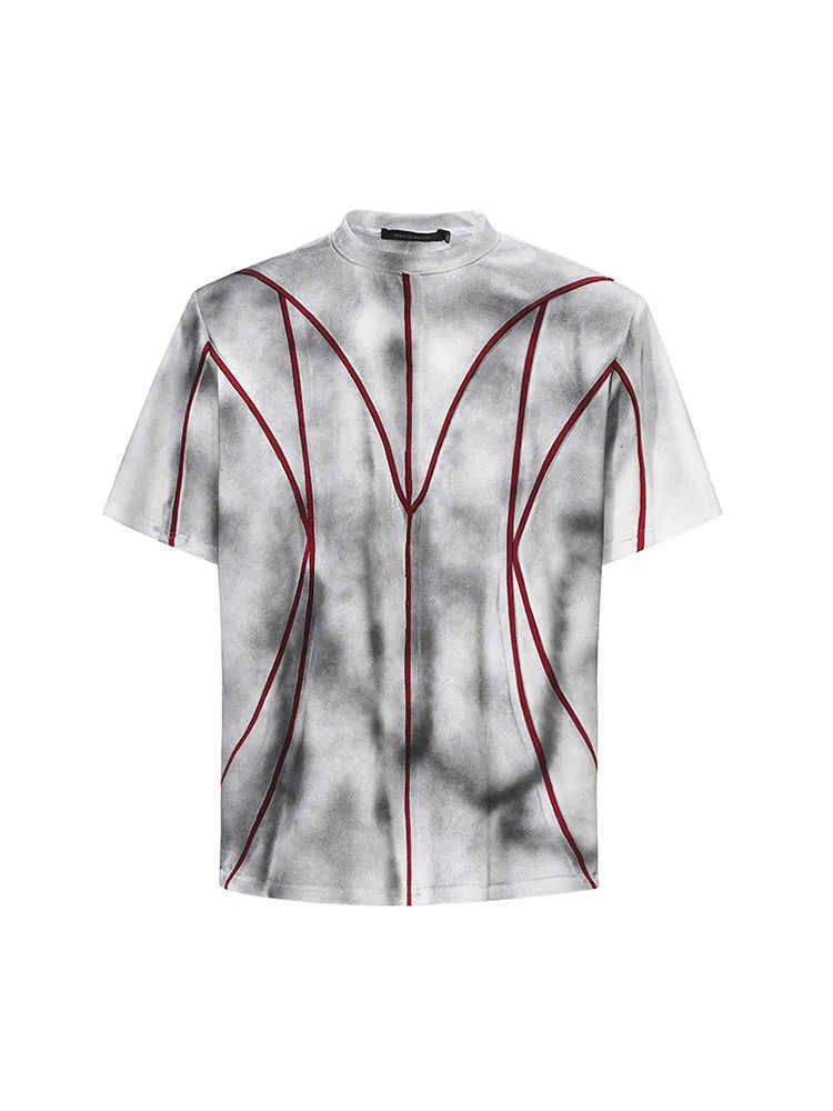 Padded shoulder short sleeve t-shirt with raised 3D line patchwork detailing on the front.