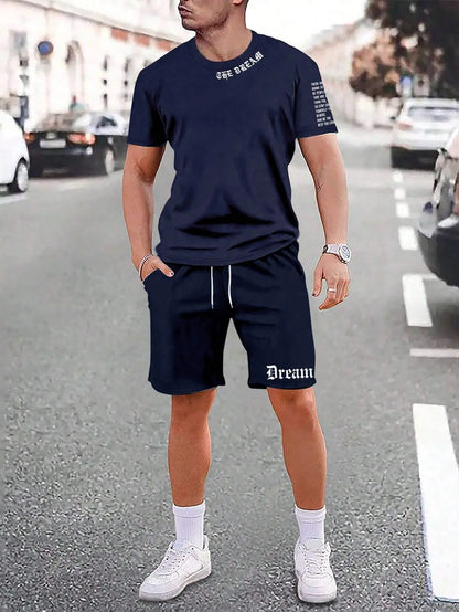 Man wearing a printed short-sleeve top and matching shorts from the sports style two-piece set.