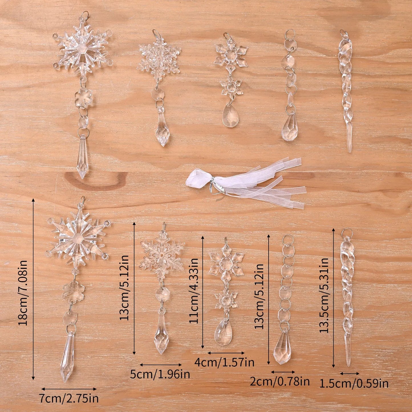 10 clear acrylic ice cone Christmas tree ornaments with hanging ribbons on green branches