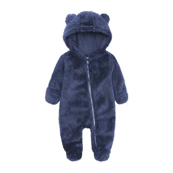 Adorable baby wearing a cozy polyester and cotton hooded jumpsuit with a cute bear-ear design