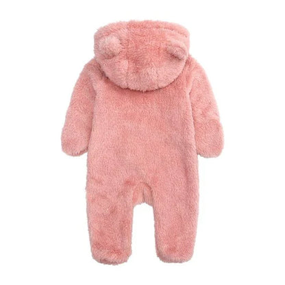 Adorable baby wearing a cozy polyester and cotton hooded jumpsuit with a cute bear-ear design