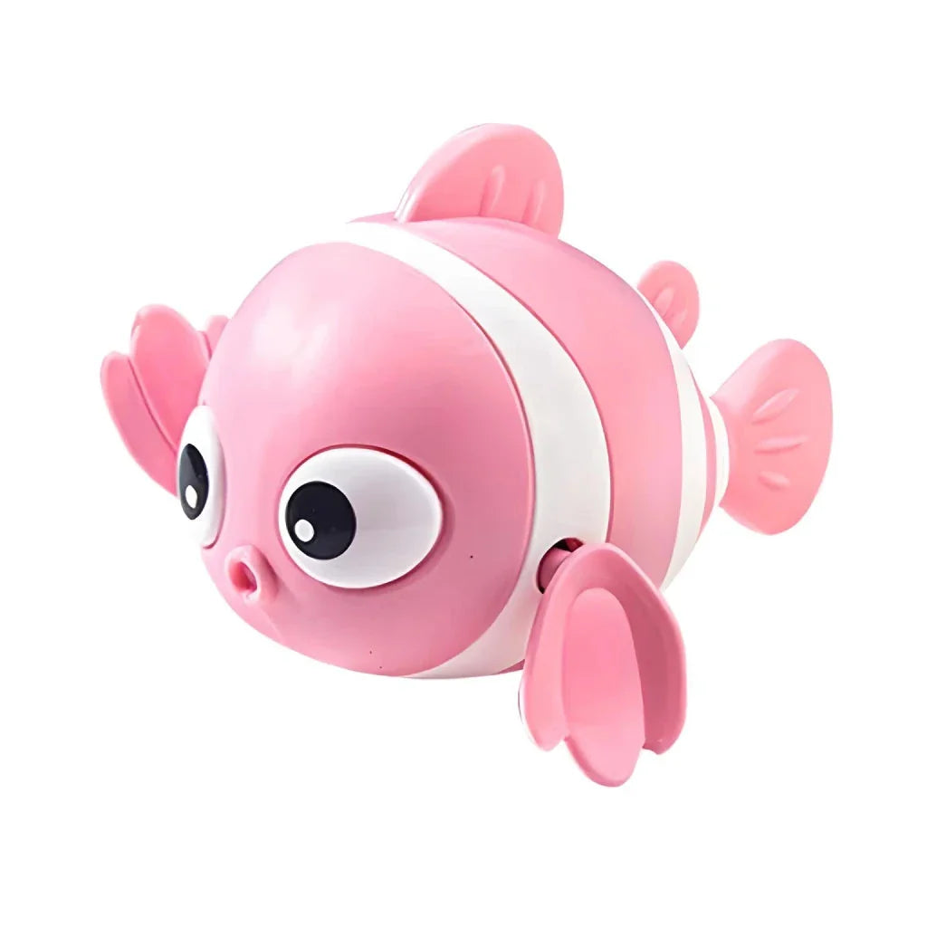A pink wind-up swimming fish toy for babies and toddlers to play with during bath time.