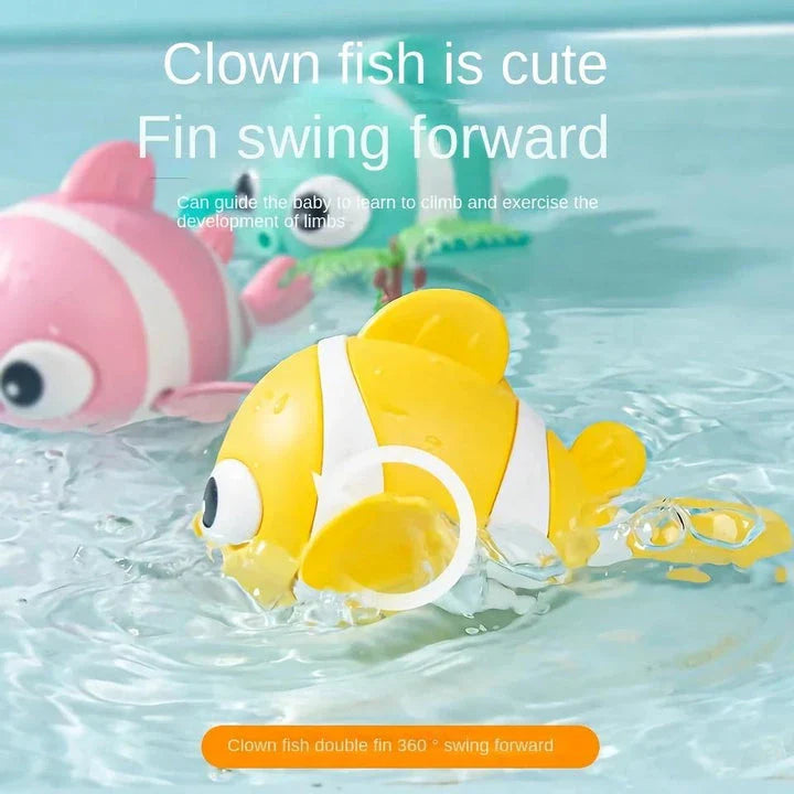 A pink wind-up swimming fish toy for babies and toddlers to play with during bath time.