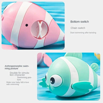 A pink wind-up swimming fish toy for babies and toddlers to play with during bath time.