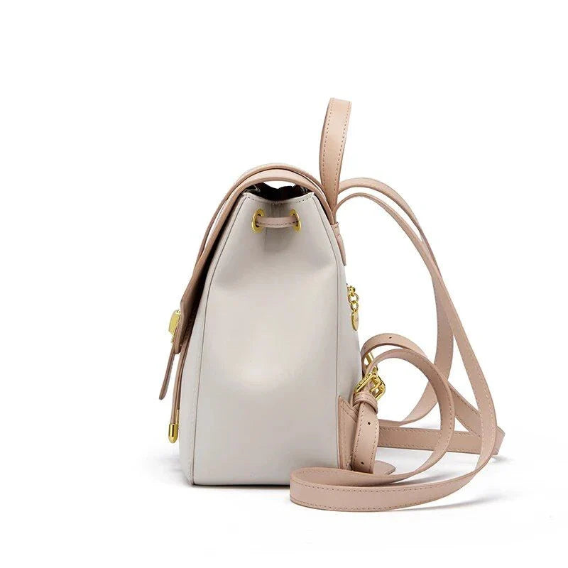 Chic cowhide leather backpack featuring premium split leather, ergonomic design, and spacious storage for the modern woman.