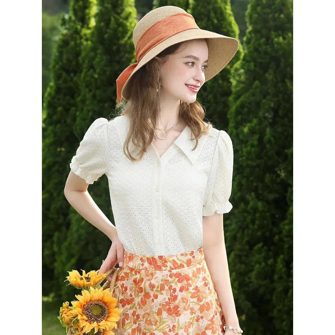 Elegant apricot-colored blouse with French lace details, puff short sleeves, and a V-neck collar