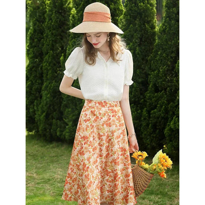 Elegant apricot-colored blouse with French lace details, puff short sleeves, and a V-neck collar
