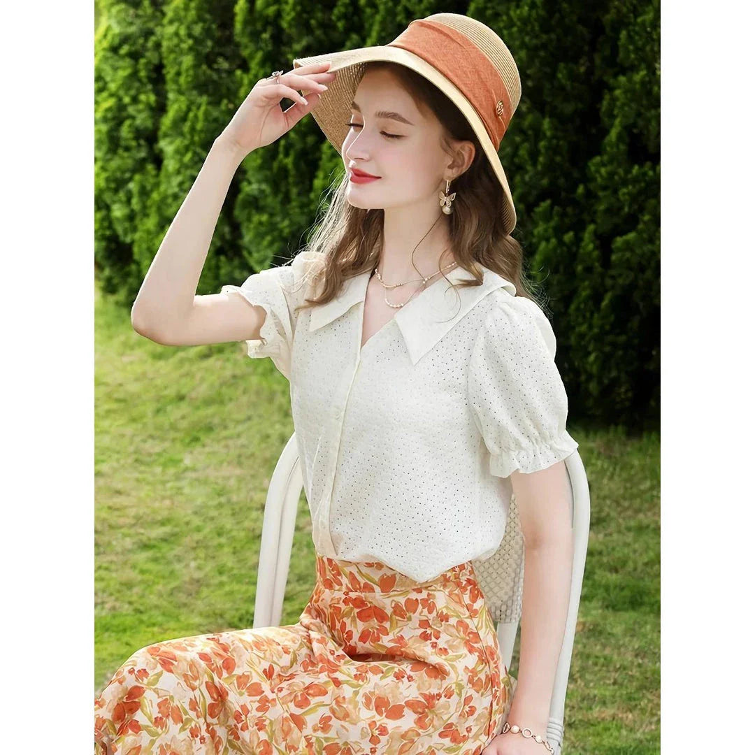 Elegant apricot-colored blouse with French lace details, puff short sleeves, and a V-neck collar