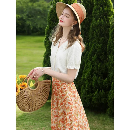 Elegant apricot-colored blouse with French lace details, puff short sleeves, and a V-neck collar