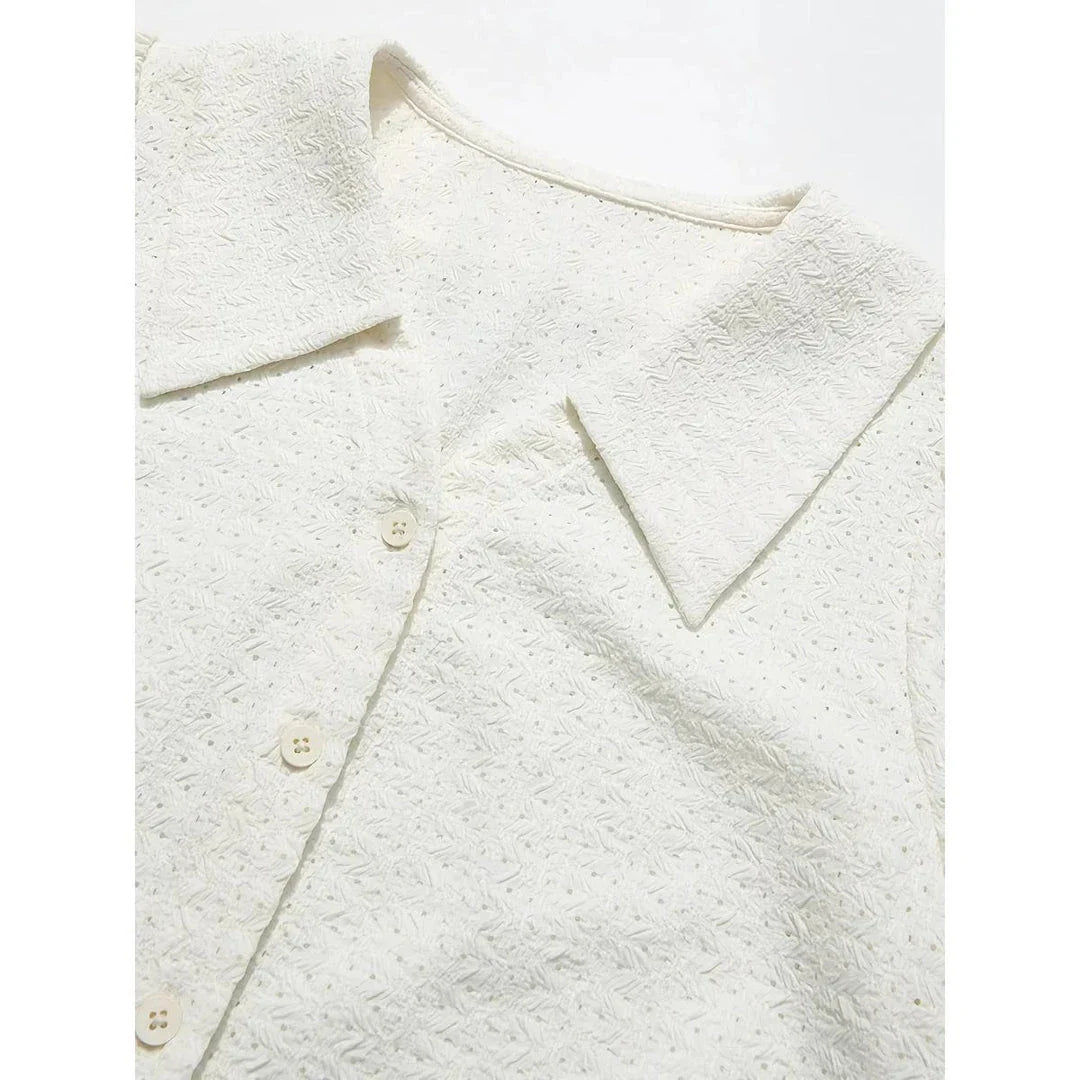 Elegant apricot-colored blouse with French lace details, puff short sleeves, and a V-neck collar