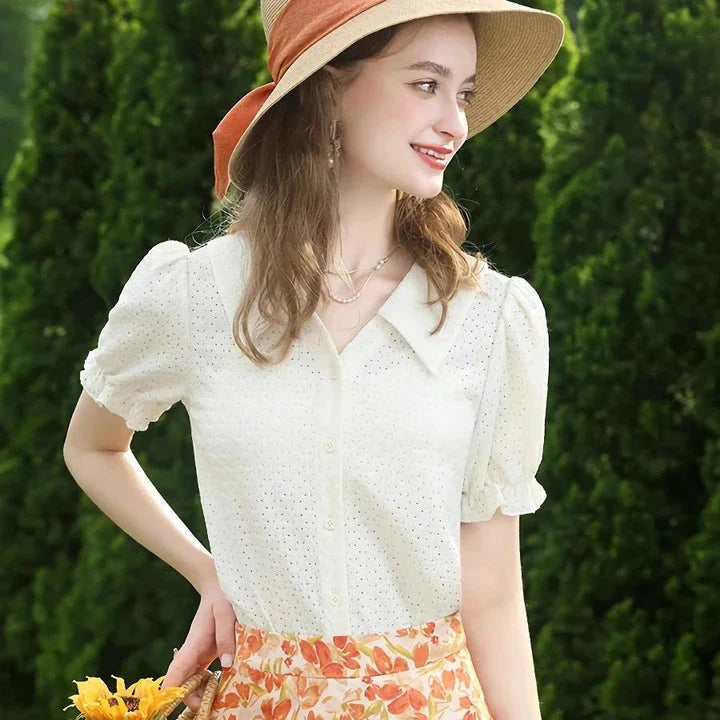 Elegant apricot-colored blouse with French lace details, puff short sleeves, and a V-neck collar