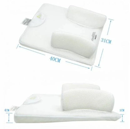 Newborn baby sleeping comfortably on the Baby Sleep Fixed Position & Anti Roll Pillow, with elevated head and air vent bumpers for optimal breathing and cooling.