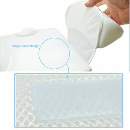 Newborn baby sleeping comfortably on the Baby Sleep Fixed Position & Anti Roll Pillow, with elevated head and air vent bumpers for optimal breathing and cooling.