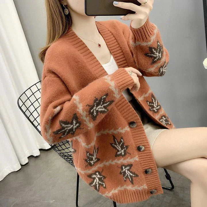 Women's maple leaf jacquard knitted cardigan in a loose, cozy fit with a V-neck and long sleeves