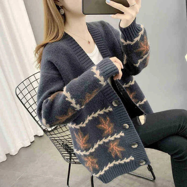 Women's maple leaf jacquard knitted cardigan in a loose, cozy fit with a V-neck and long sleeves