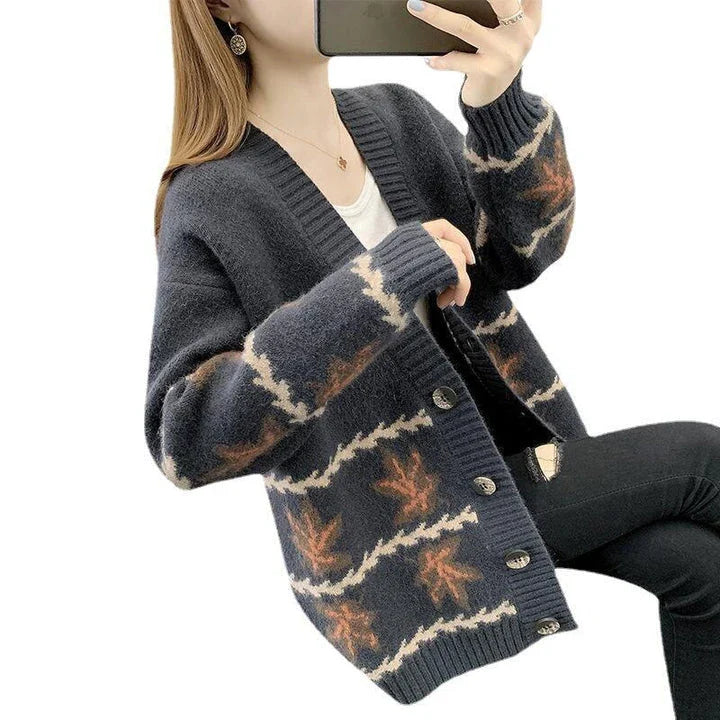 Women's maple leaf jacquard knitted cardigan in a loose, cozy fit with a V-neck and long sleeves