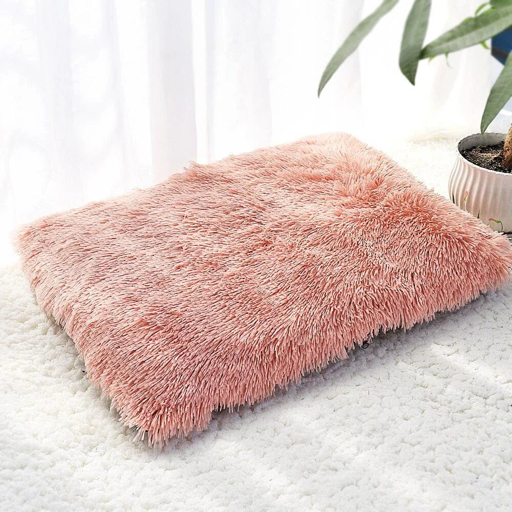 A cozy and plush pet bed in various color options, designed to provide ultimate comfort and relaxation for your furry friend.