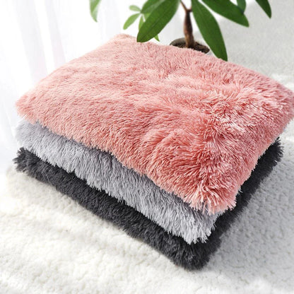 A cozy and plush pet bed in various color options, designed to provide ultimate comfort and relaxation for your furry friend.