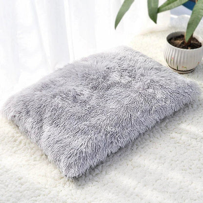 A cozy and plush pet bed in various color options, designed to provide ultimate comfort and relaxation for your furry friend.