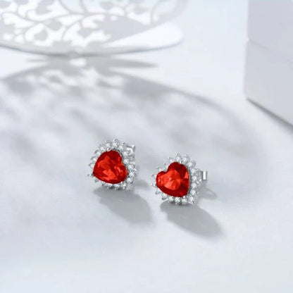 Elegant heart-shaped earrings in rhodium-plated 925 sterling silver with dazzling cubic zirconia stones