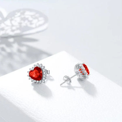 Elegant heart-shaped earrings in rhodium-plated 925 sterling silver with dazzling cubic zirconia stones
