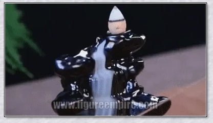A multi-layered ceramic incense burner creating a cascading waterfall effect with calming aroma diffusion