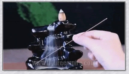 A multi-layered ceramic incense burner creating a cascading waterfall effect with calming aroma diffusion