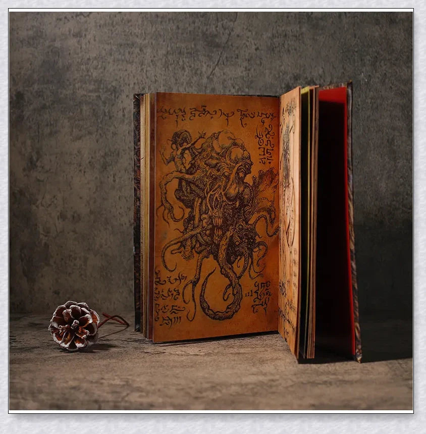 Necronomicon-inspired dark magic prop book with demonic face binding and barbed wire wrapping