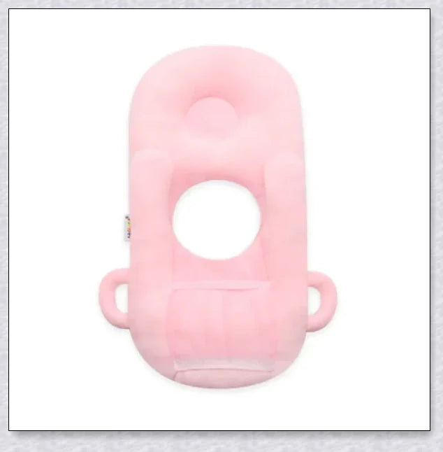 A soft, supportive pillow designed for hands-free baby feeding, featuring a secure bottle holder and premium, BPA-free materials.