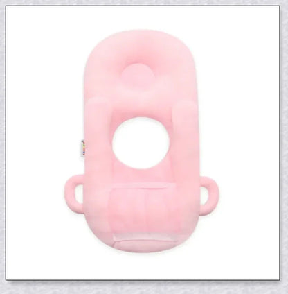A soft, supportive pillow designed for hands-free baby feeding, featuring a secure bottle holder and premium, BPA-free materials.