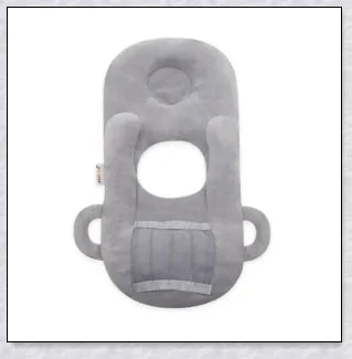 A soft, supportive pillow designed for hands-free baby feeding, featuring a secure bottle holder and premium, BPA-free materials.